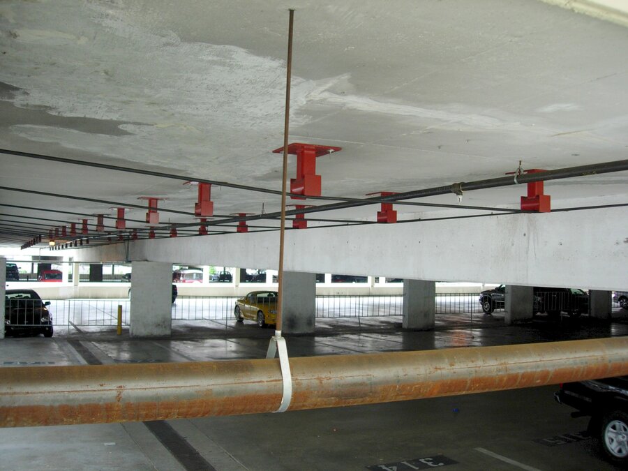 Coronado Apartments external post-tensioning retrofit hardware